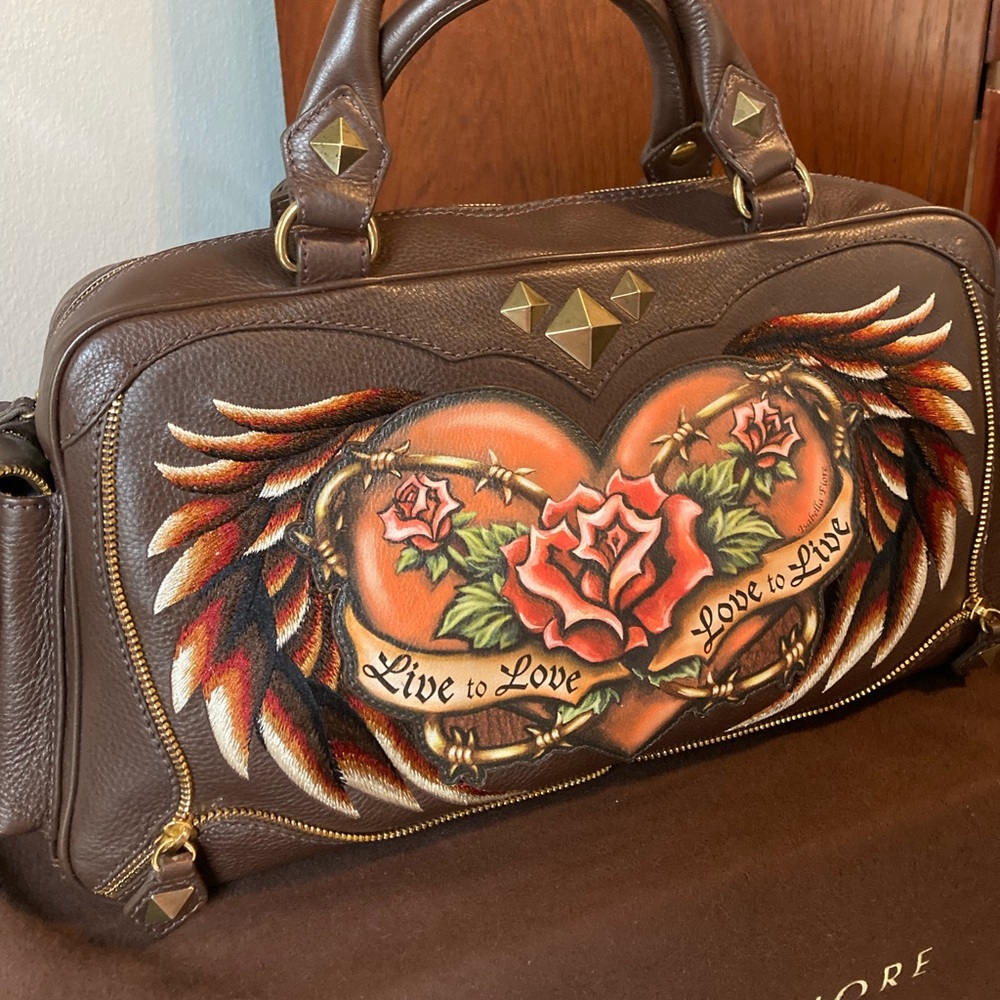BRAND NEW Live To Love Brown Leather with original Packaging and strap $625.00